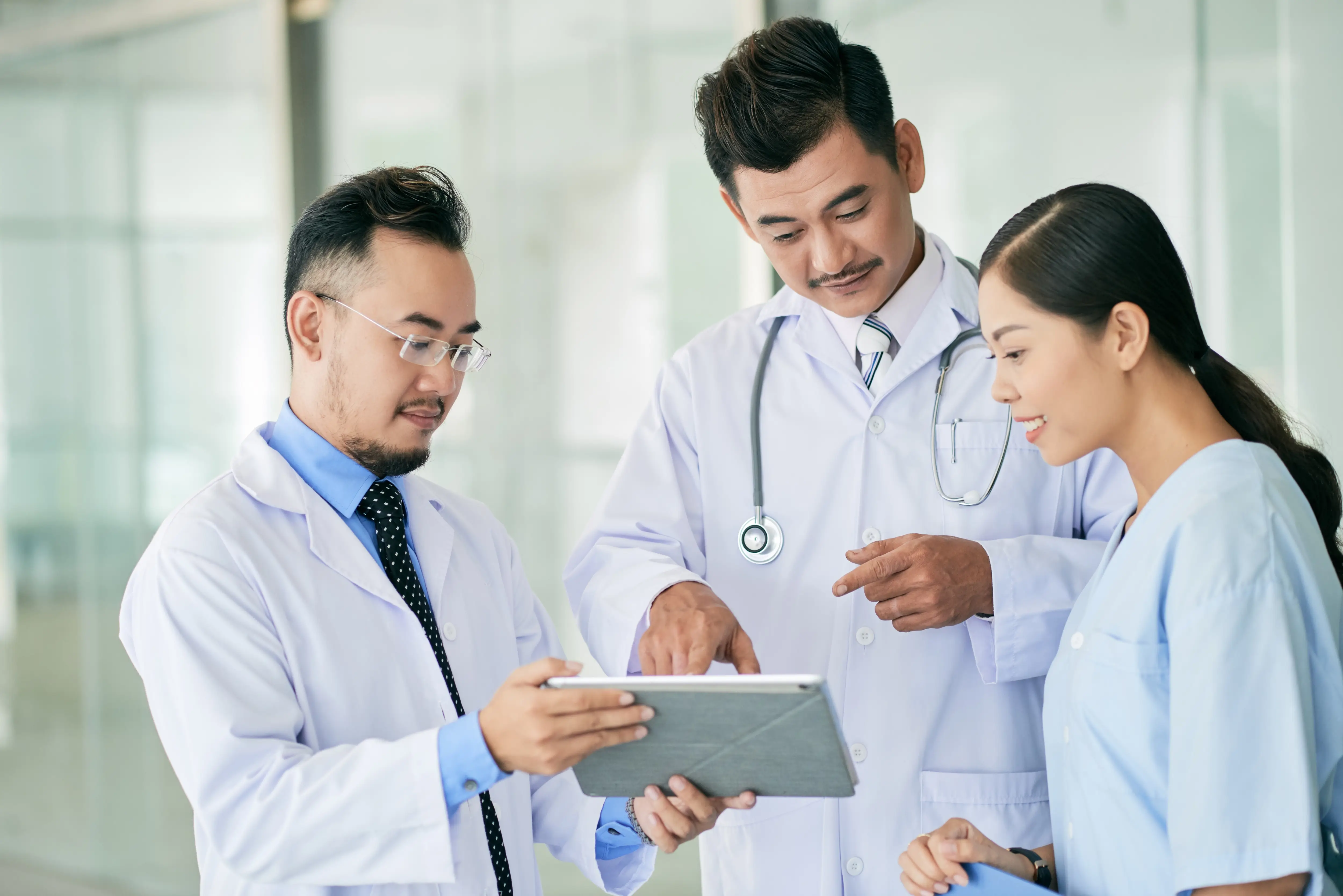 Healthcare professionals reviewing patient data together